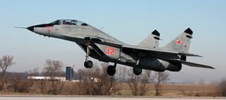 Illustration for article titled You Have $4 Million, Do You Buy A Bugatti Veyron SS Or MiG-29UB?